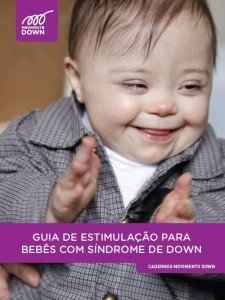 Foto da capa do guia, menininha com sindrome de Down batendo palmas.