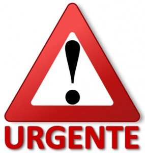 Sinal de interrogação em placa de trânsito e a palavra URGENTE em vermelho.